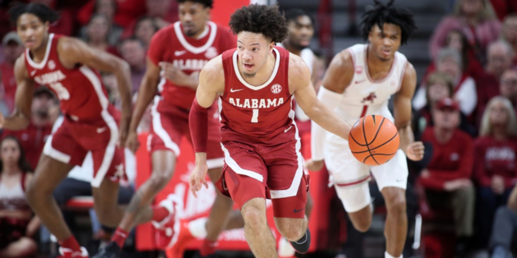 No. 4 Alabama uses late runs to put away No. 15 Arkansas