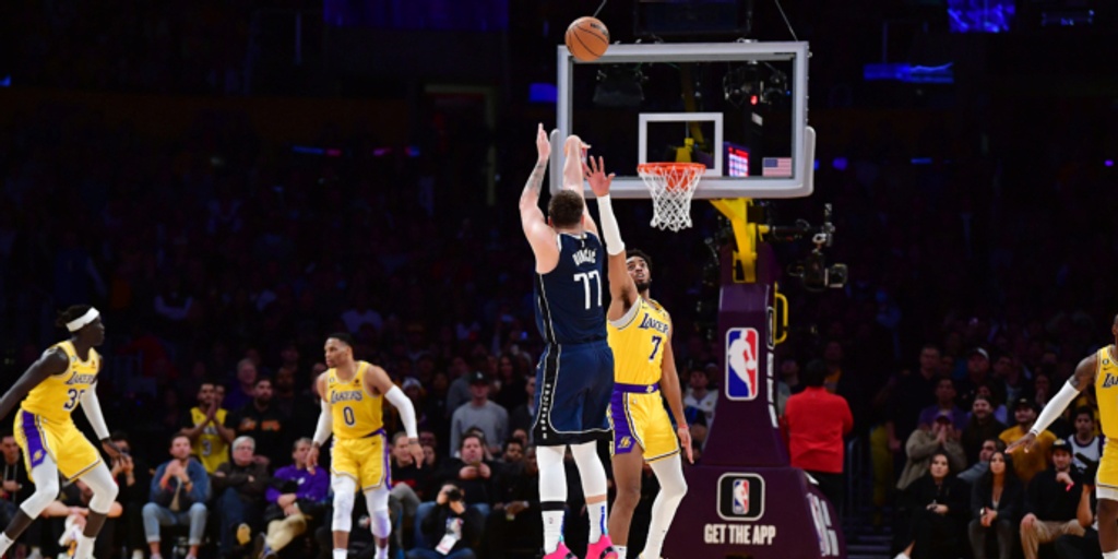 Doncic hits 2 big 3-pointers, Mavs top Lakers 119-115 in 2OT