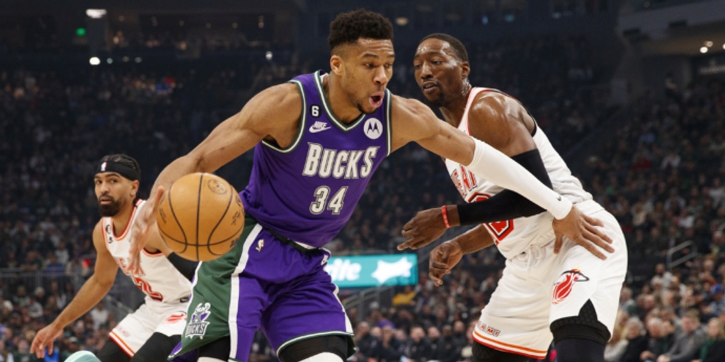 Bucks rip Heat 128-99 after Giannis exits early with knee issue