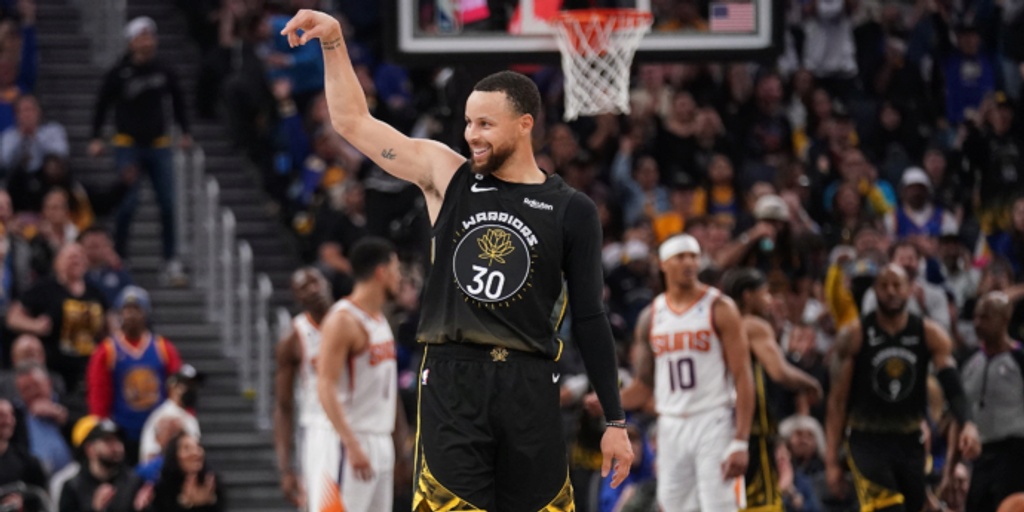 Klay Thompson, Steph Curry lead Warriors past Suns 123-112