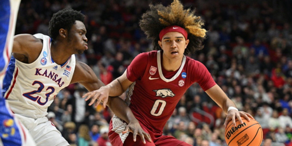 March Madness: Eighth-seeded Arkansas ousts defending champ Kansas