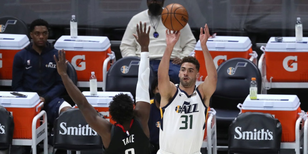 NBA-leading Jazz are first team to 50 wins with 124-116 victory over Rockets