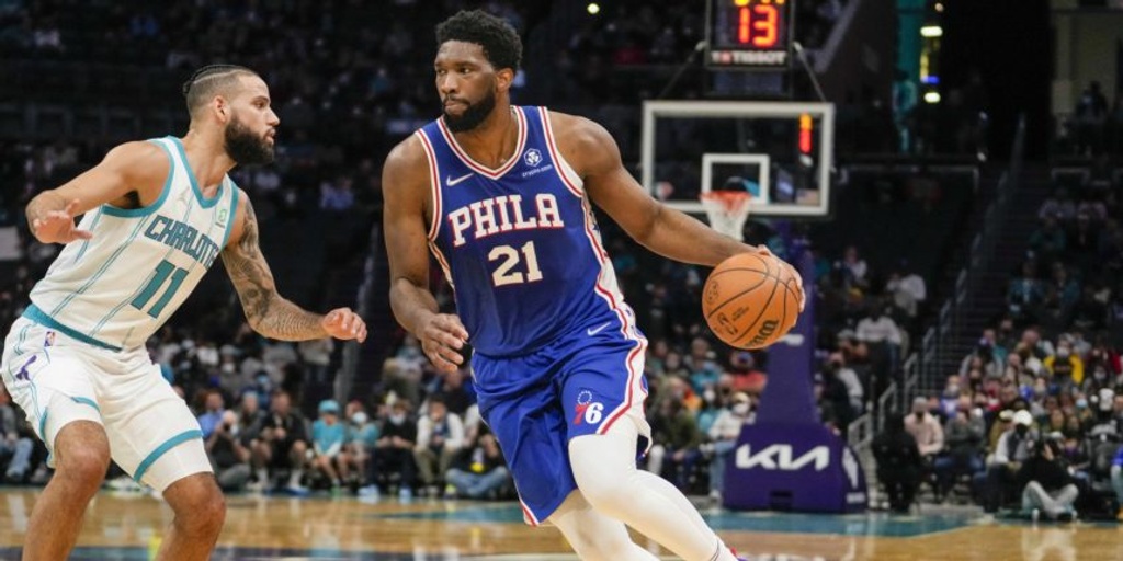 Embiid scores 43, 76ers hold off pesky Hornets 127-124 in OT