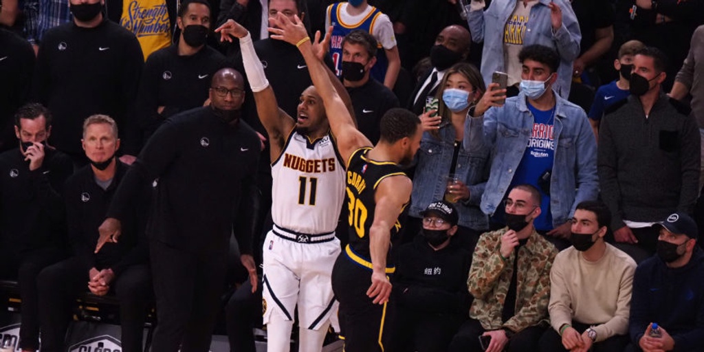 Morris returns from concussion, beats Buzzer to send Nuggets past Warriors