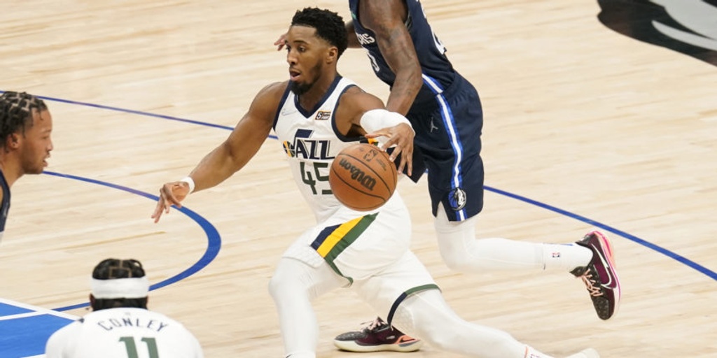 Mitchell, Jazz win opener 99-93 as Mavs play without Doncic
