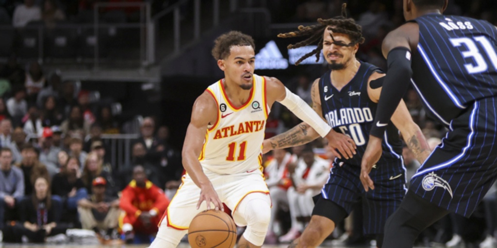 Young, Collins power Hawks past Magic 108-98