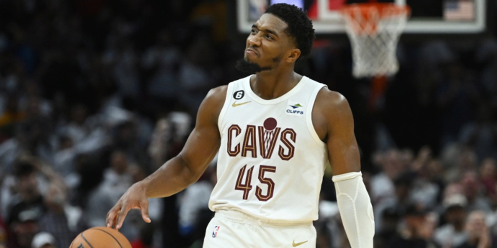 Mitchell scores 37 in home debut, Cavs beat Wizards in OT