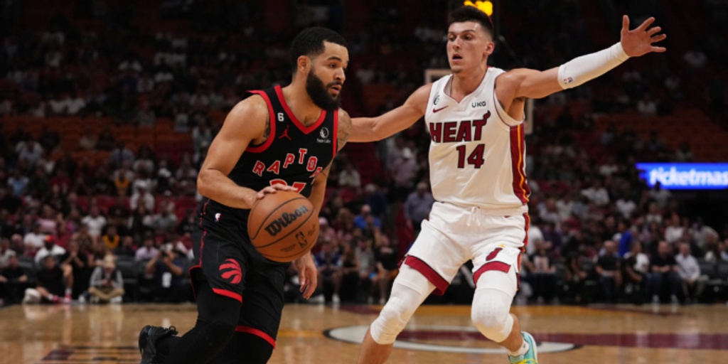 Raptors clamp down on Miami, top Heat 98-90 for split
