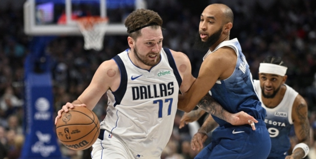 Luka Doncic, Kyrie Irving combine for 69 points as Mavs defeat Wolves