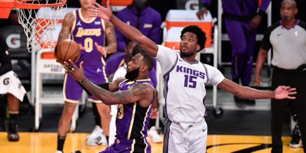 Kings spoil LeBron James' return with 110-106 win over Lakers