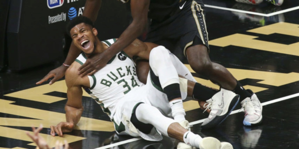Giannis Antetokounmpo hyperextends knee in loss, status unclear