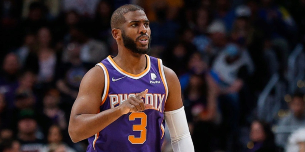 Paul's back, Booker has 49 as Suns clinch top seed with win in Denver