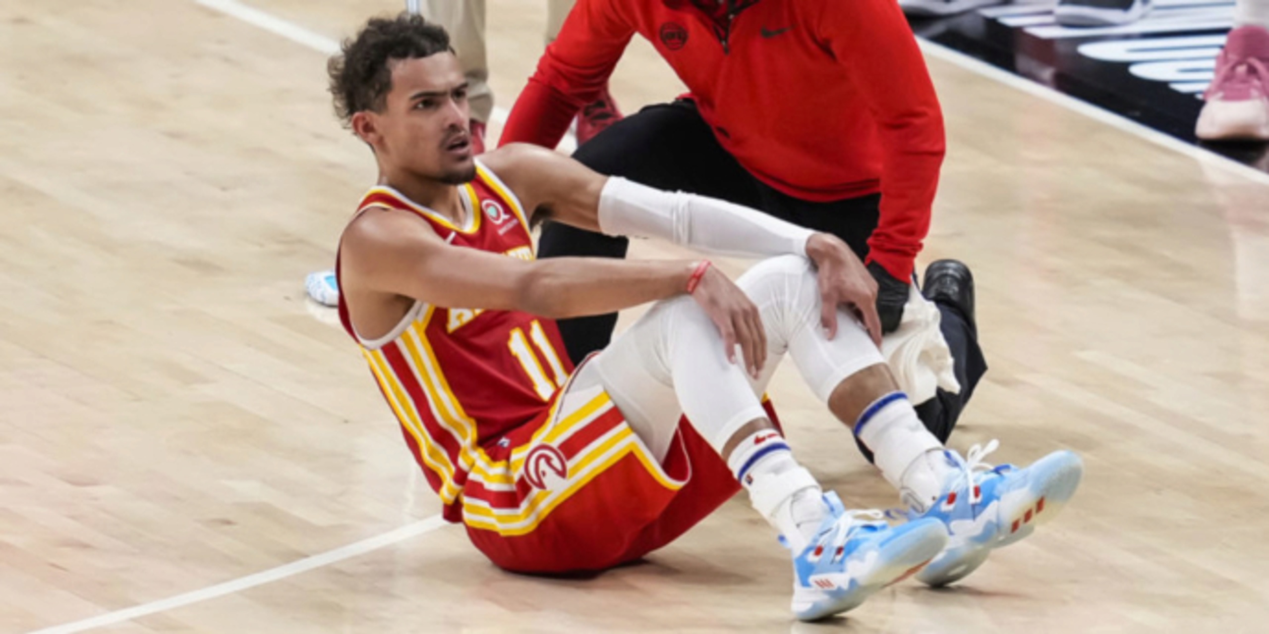 All eyes on Trae Young's ankle after freak encounter with ref