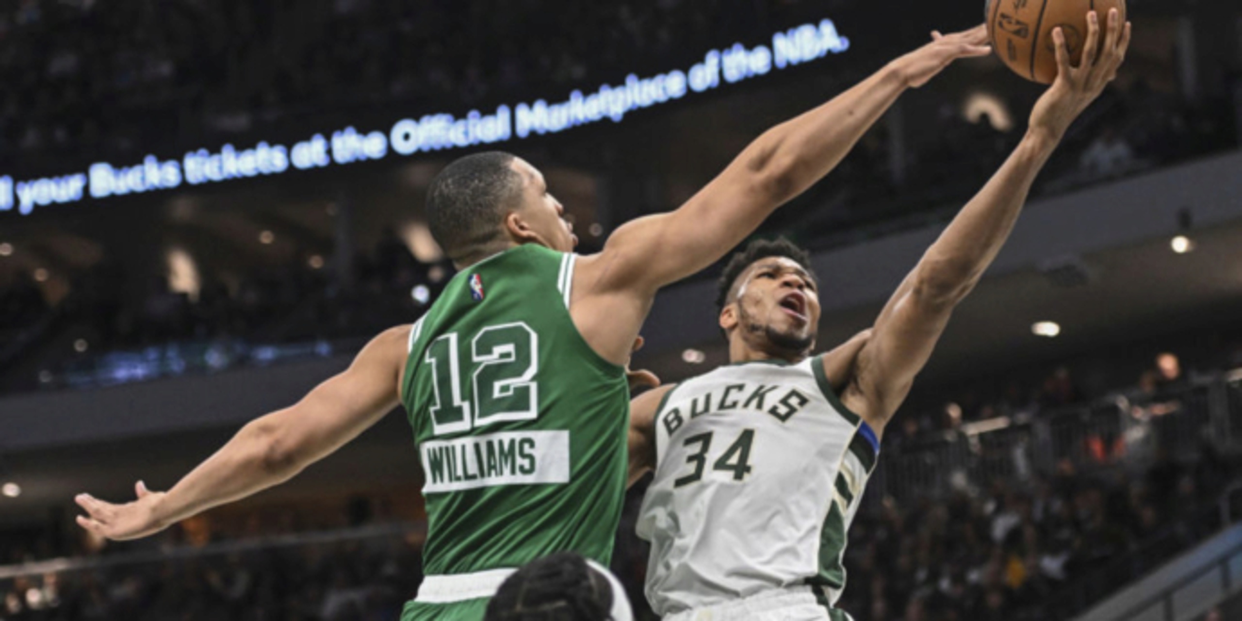 Giannis, Holiday help Bucks rally past Celtics 127-121