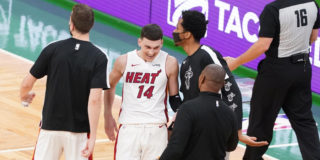 Heat clinch playoff spot with 129-121 victory over Celtics