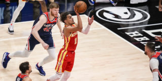 Hawks clinch playoff berth behind Trae Young's 33 points