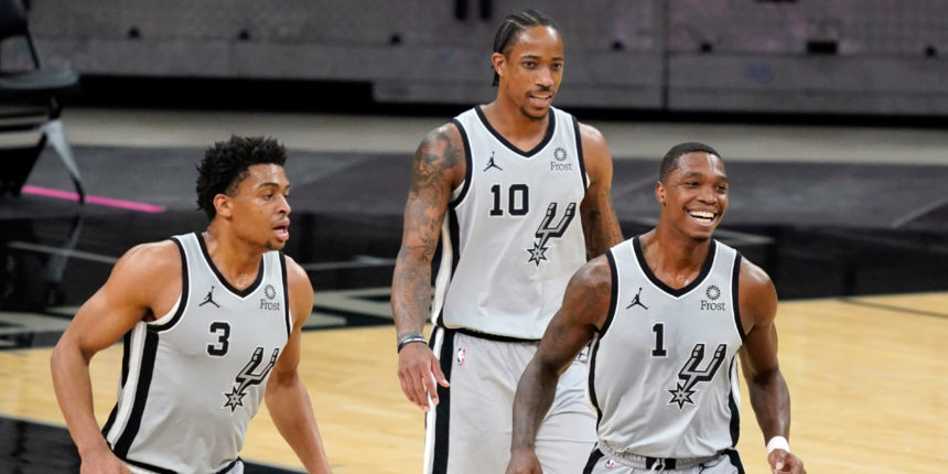 Spurs' veterans, young core getting it done together